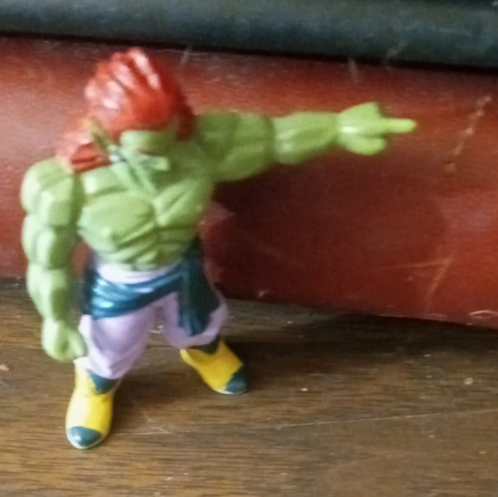 Dragon ball Z Green Elf Action Figure Toy with Red Hair and Yellow Boots